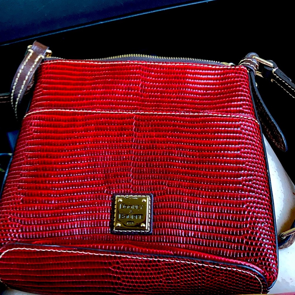 Dooney and Bourne red pebbled leather crossbody.